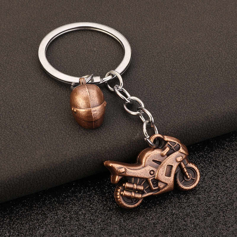 ヴィンテージマルチカラーモーターサイクルヘルメットキーホルダ - Vintage Fashion Enthusiasts のレビューと価格